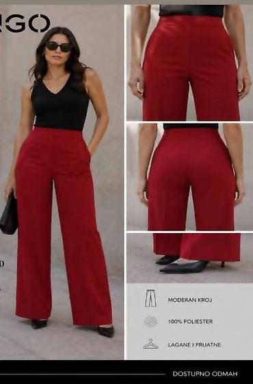 dg patike: Crvene svecane pantalone 
Vel 44 
Cena 2800 din — 1
