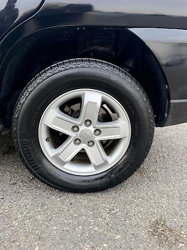 Kia: Kia Sportage: 2.7 l | 2008 il Krossover — 13