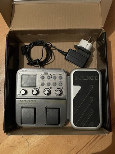 Gitaralar: Nux MG-100 gitara prosessoru Yenidir: qutu, adapter, sənədi tam