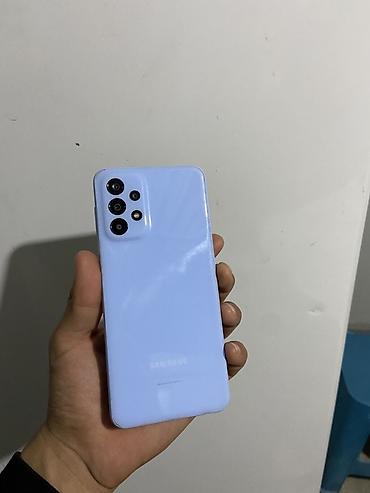 Смартфон Samsung Galaxy A23, цвет небесно-голубой. Имеется небольшая