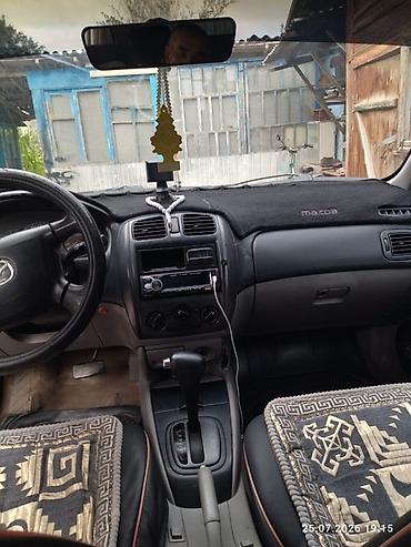 e53 amg: Mazda Familia: 2002 г., 1.6 л, Универсал — 10