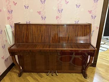 Upright royal pianino - Korpus: parlaq cilalı, tünd taxta teksturalı lalafo.az -da Upright royal pianino - Korpus: parlaq cilalı, tünd taxta teksturalı