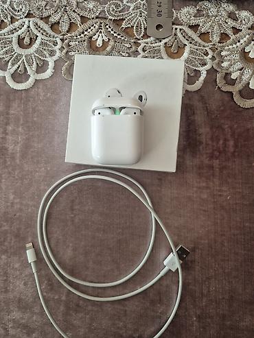 balaca quran kitabi: Apple AirPods (2-ci nəsil) – qutu komplekti Xüsusiyyətlər: - Simsiz — 4