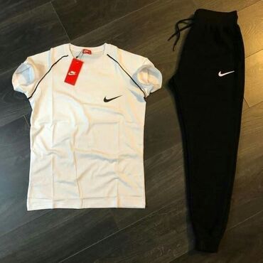 найк спортивный костюм: Спортивный костюм Nike, состоящий из футболки и брюк, идеально