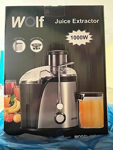 cəkmək ucun şəkillər: Wolf Juice Extractor şirəçəkən Mətbəxdə meyvə və tərəvəzlərdən təzə — 1
