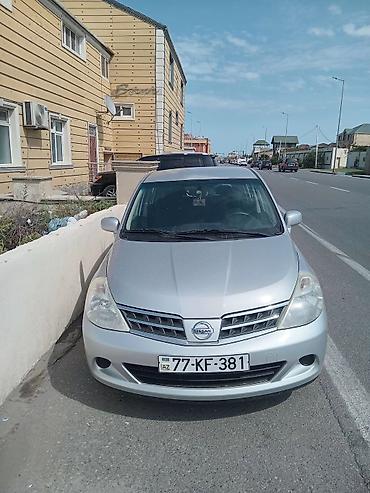 07 satşı: Nissan Tiida, gümüşü rəng, hatchback kuzov. Əsas xüsusiyyətlər: - — 3