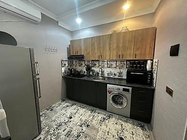 Mənzillər: Binəqədi qəs., 2 otaqlı, Yeni tikili, m. Memar Əcəmi, 55 kv. m — 4