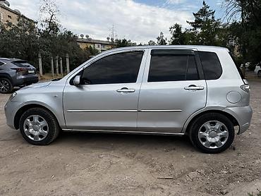 golf 4: Mazda Demio: 2003 г., 1.3 л, Автомат, Бензин, Хэтчбэк — 6
