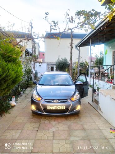 06 maşın: Hyundai Accent: 1.6 l | 2014 il Hetçbek