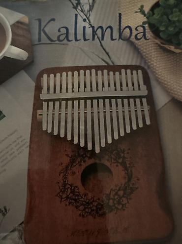 elektro gitara satisi: Kalimba (barmaq pianinosu) – taxta korpuslu, metal dillərlə — 6