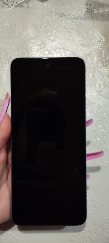 redmi note 9 azerbaycan: Redmi smartfon – açıq göy rəngdə korpus Xüsusiyyətlər: - Ekran: tam — 1