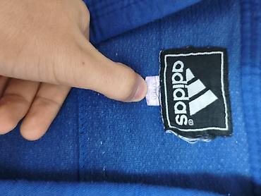 İdman formaları: Məhsul: Adidas mavi cüdo kimono dəsti Tərkib: - Jaket (yuxarı hissə) — 4