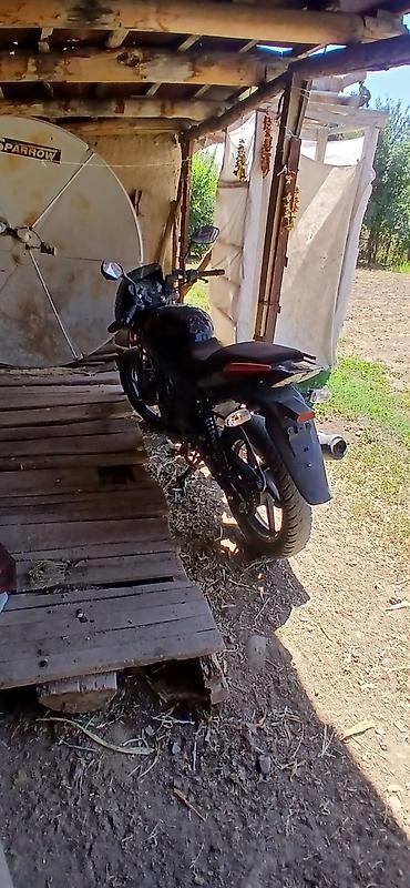 daewoo matiz 2004: Мотоцикл Bajaj Pulsar 180, черный. Ключевые особенности: - Двигатель — 2
