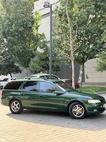 Транспорт: Opel Vectra: 2 л | 1997 г. 367000 км Универсал — 7