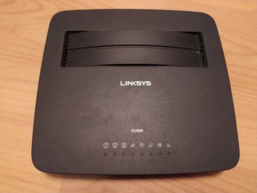 adsl: ADSL modem router Linksys X1000-M2 Wi-Fi Router ADSL2+ Modem N300