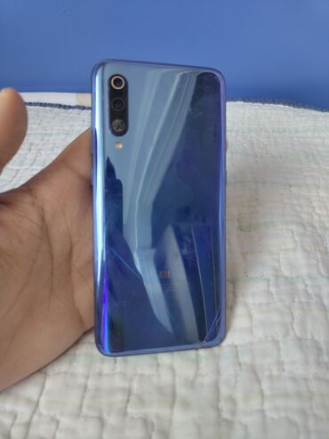 продаю айфон 6: Xiaomi Mi 9, 64 GB, rəng - Göy, 
 Sensor, Barmaq izi, Simsiz şarj