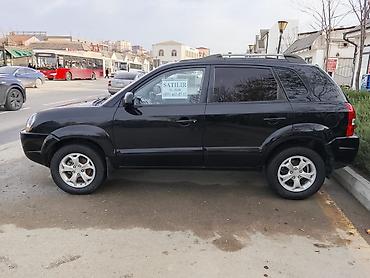 ручка фольксваген: Hyundai Tucson: 2 л | 2008 г. Кроссовер — 4