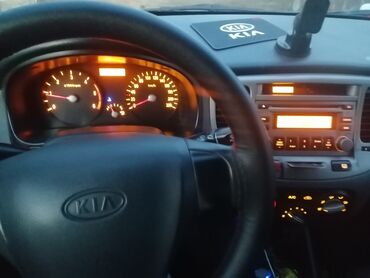 Kia: Kia Pride: 1.5 l | 2006 il Sedan — 2