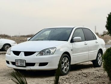 странный машина: Mitsubishi Lancer: 2003 г., 1.8 л, Автомат, Бензин, Седан