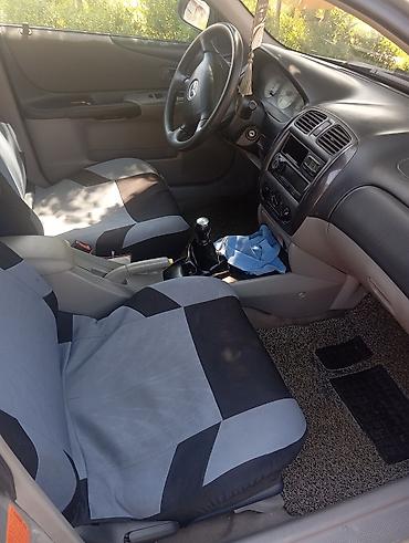 демио пороги: Mazda Familia: 2002 г., 1.6 л, Механика, Бензин, Универсал — 4