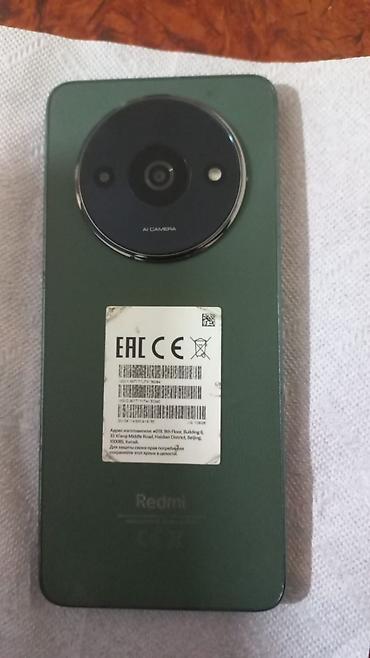 redmi not 9 ikinci el: Redmi smartfon - Rəng: yaşıl - Arxa panel: dairəvi modulda AI Camera — 1