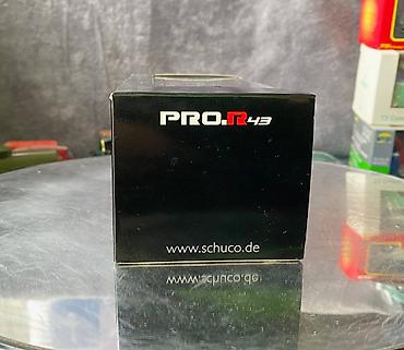 Avtomobil modelləri: Коллекционная модель Mercedes-Benz 200 W123 Hearse black 1982 Schuco — 2