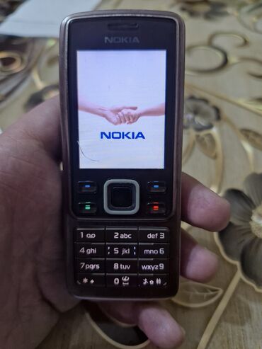 telefon alışı: Nokia 6300 4G, 2 GB, rəng - Qəhvəyi, Düyməli