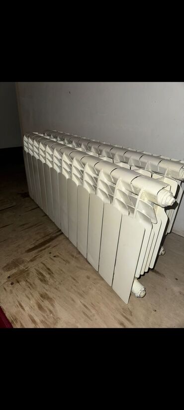 Digər tikinti materialları: 2ədəd 24 Seksiyalı radiator bir seksiyası *6.50₼ təcili satılır* ölçü