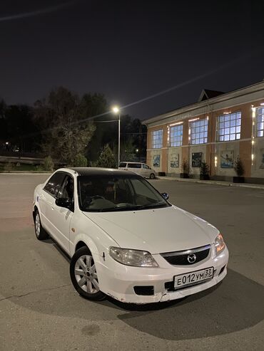 Mazda: Mazda Familia: 2001 г., 1.5 л, Автомат, Бензин, Седан