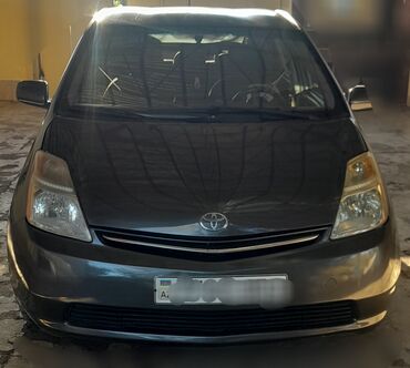 Toyota: Toyota Prius (2-ci nəsil) – hibrid hetçbek Xüsusiyyətlər: - Gümüş-boz — 1