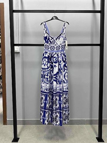 helena plus: Letnja maxi haljina sa plavobelim mediteranskim printom
2900 din
S M L — 2