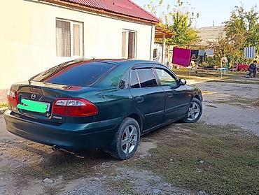 производитель ключей: Mazda 626: 2000 г., 2 л, Автомат, Бензин, Седан — 4
