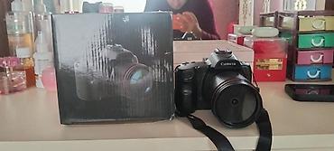 Elektronika: Məhsul: Foto/video kamera (DSLR tərzində) Təsvir: - Qara gövdə — 1