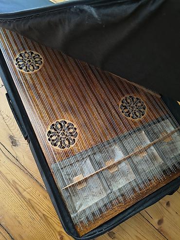 Саз: Məhsul: Kanon (şərq simli musiqi aləti) – yumşaq çanta ilə Təsvir: - — 1
