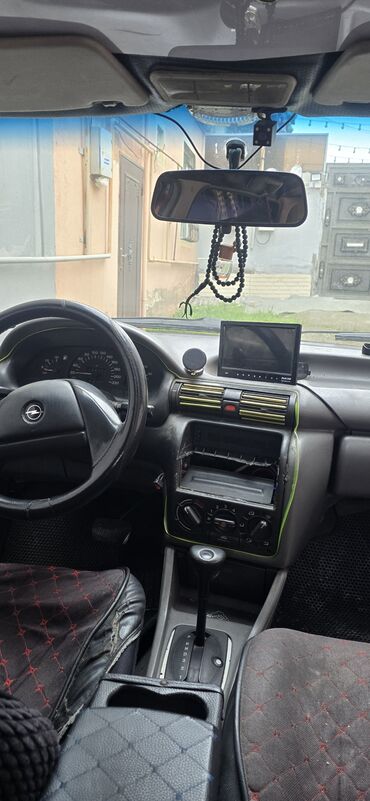 Opel: Opel Astra: 1.6 l | 1993 il Sedan — 13