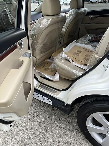kia rio sukan: Hyundai Santa Fe: 2 l | 2009 il Krossover — 7