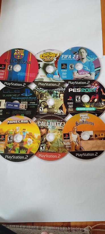 ps1 oyun: Sony PlayStation 2 Slim (PS2) oyun konsolu üstündə iki işlək pult 17 — 5