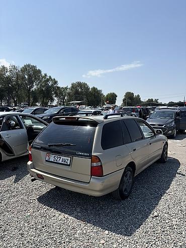 Транспорт: Mitsubishi Lancer: 1995 г., 1.6 л, Автомат, Бензин, Универсал — 4