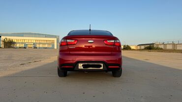 Kia: Kia Pride: 1.4 l | 2013 il Sedan — 3