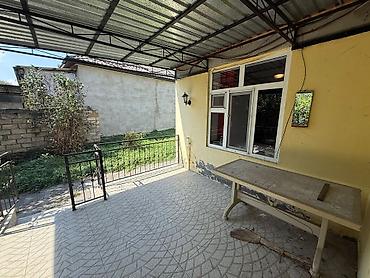 şəkidə ucuz evlər: Həyət evi geniş örtülü eyvanı və səliqəli planlanması ilə təqdim — 2