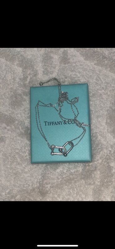 бриллиантовое кольцо цена: Элегантное колье от Tiffany & Co. с подвеской из двух