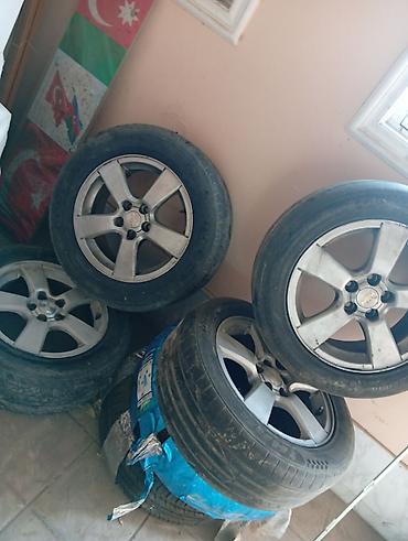 təkər az: Chevrolet orijinal yüngül lehimli disklər və təkər dəsti - Komplekt — 1