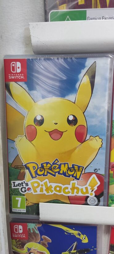 nintendo switch oyunları: Nintendo switch üçün pokemon pikachu oyun diski. Tam original