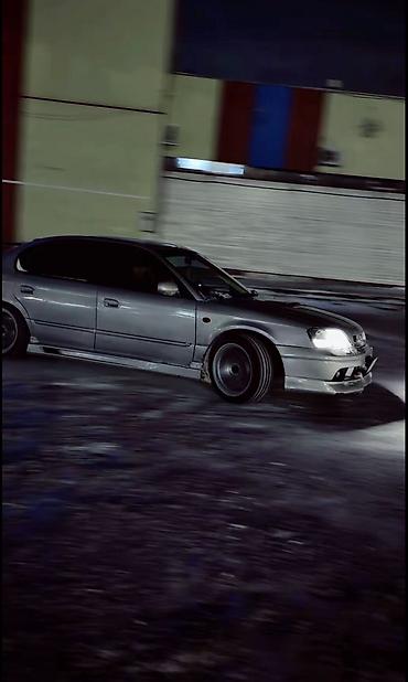 громкий выхлоп: Subaru Legacy: 1999 г., 2 л, Автомат — 8