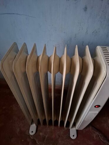 Elektrikli qızdırıcılar və radiatorlar: Istilik radiatoru. demek olarki hec iwlenmiyib.8 qabirgalidir