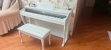 pıano: Təzədir heç işlənməyib 2000manata piano alınıb masası isə — 1