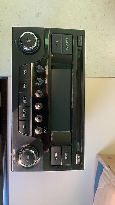 Avtoelektronika: Nissan avtomobilləri üçün orijinal multimedia/radio başlıq bloku — 1