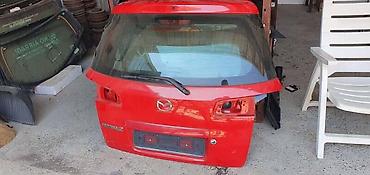 reno clio 3: GEPEK VRATA ZA MAZDA 2 | Polovni originalni delovi za Mazdu — 1