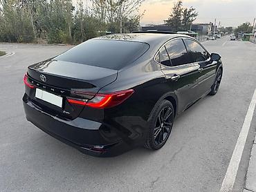 машины до 100к: Toyota Camry: 2025 г., 2 л, Вариатор, Гибрид, Седан — 4