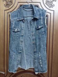 Velosiped ehtiyyat hissələri: Xanım üçün mavi rəngli cins jiletka. S/M razmerlərə rahat olur. Əyində